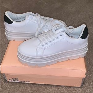 Brand new in box platform style tennis